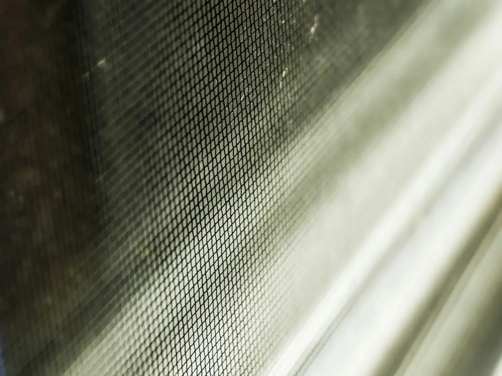 Fabric mesh fly screen