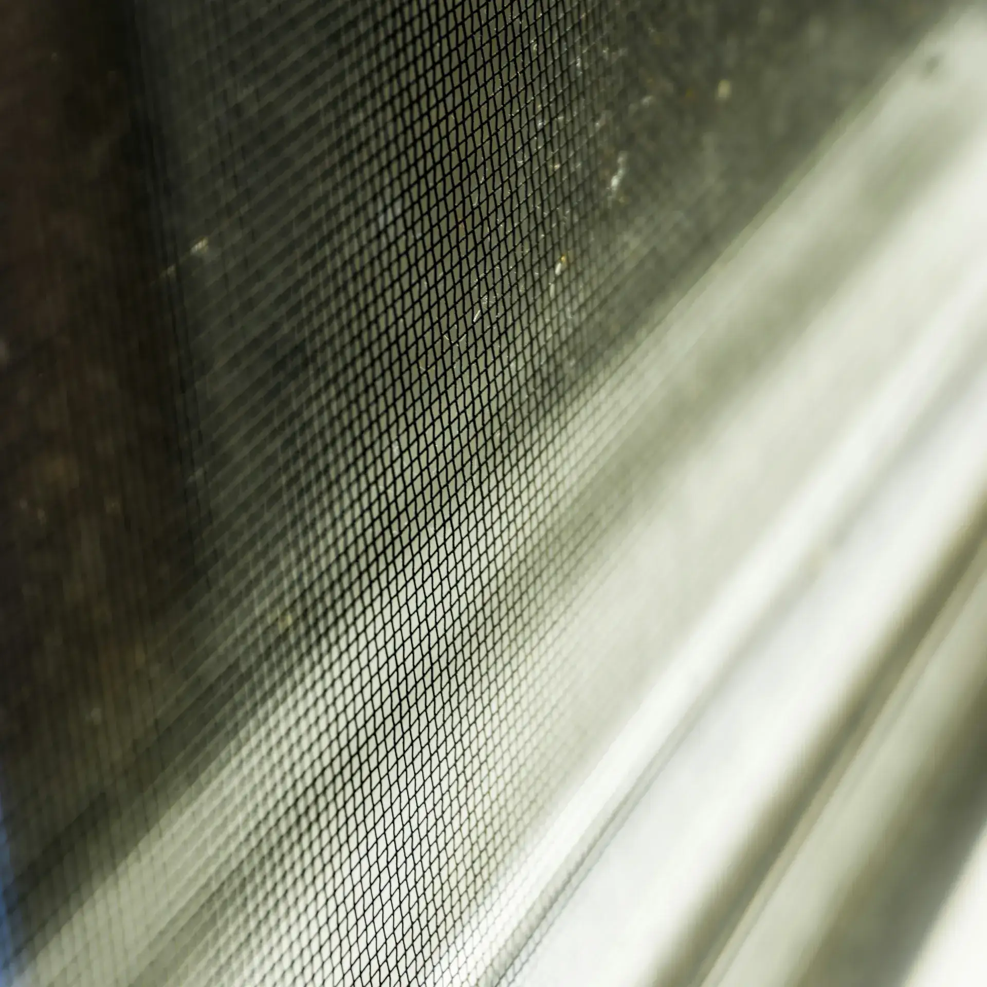 Fabric mesh fly screen